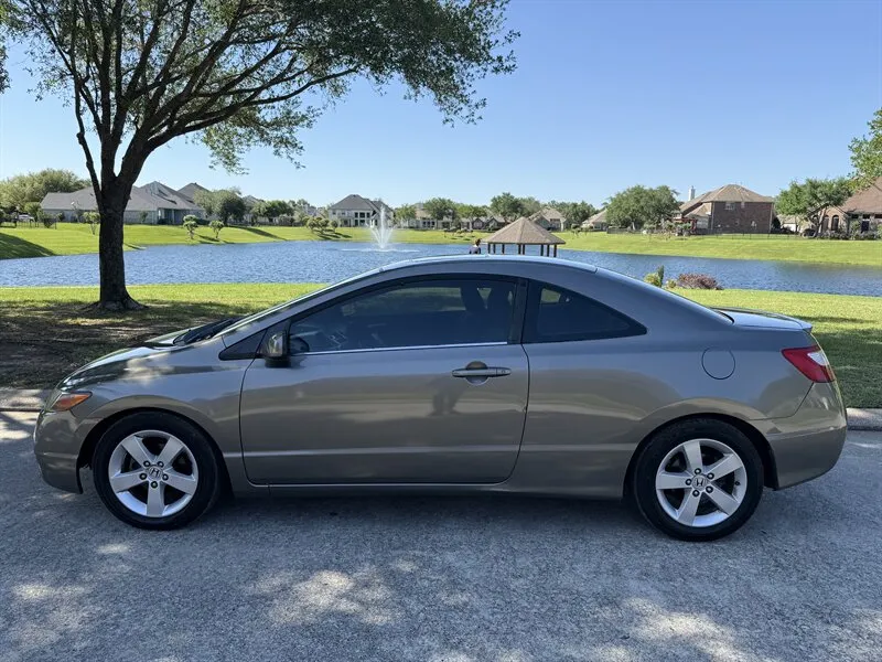 Side profile of Used 2006 Honda Civic EX for sale in Springs TX