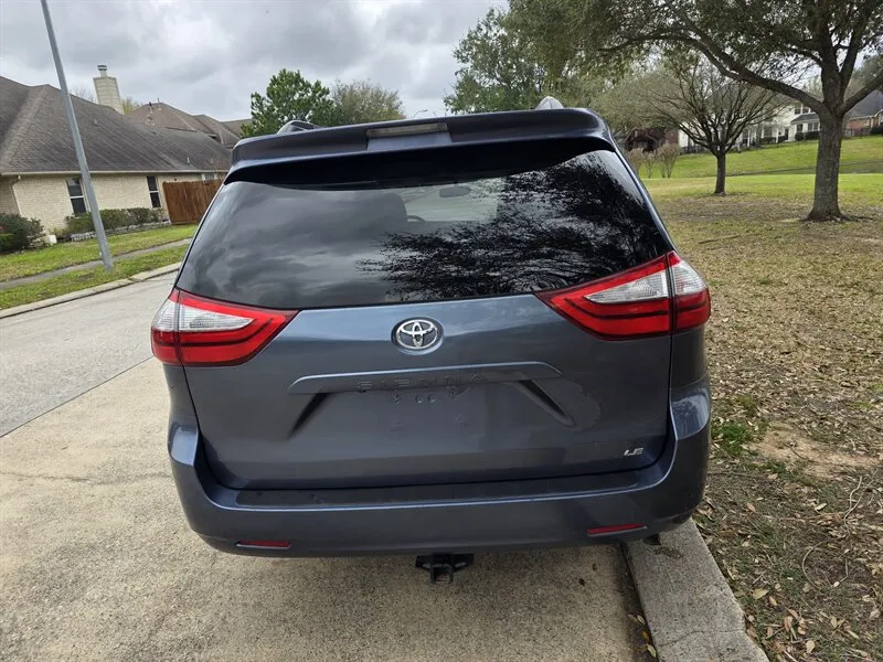 Back-side view of the Used 2015 Toyota Sienna LE 8-Passenger – Family-friendly minivan with ample space, available in Spring, TX