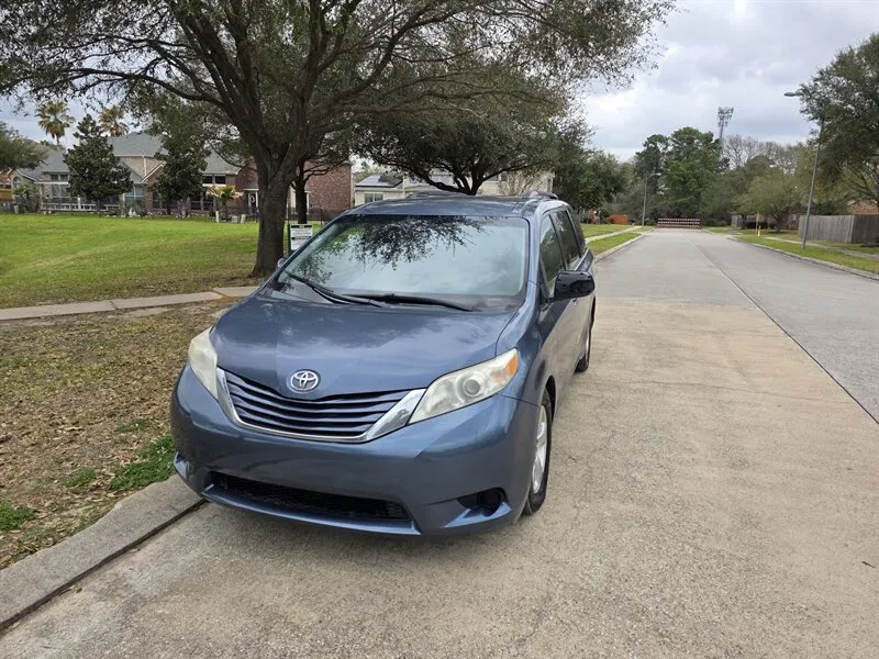 Front view of a Used 2015 Toyota Sienna LE 8 Passenger for sale in Spring TX