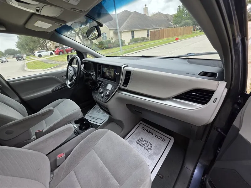 Interior view of a Used 2015 Toyota Sienna LE 8 Passenger for sale in Spring TX