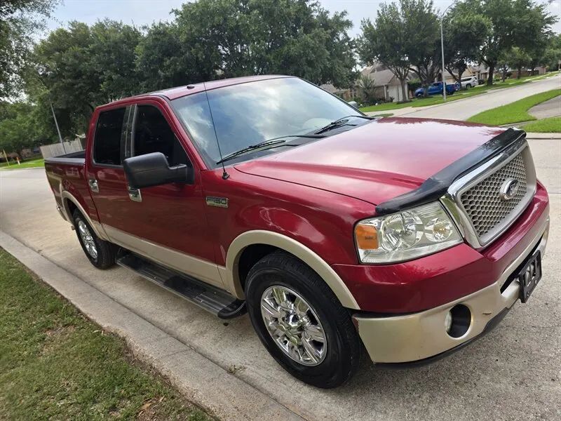 Red Ford F-150 SuperCrew used pickup near Houston TX
