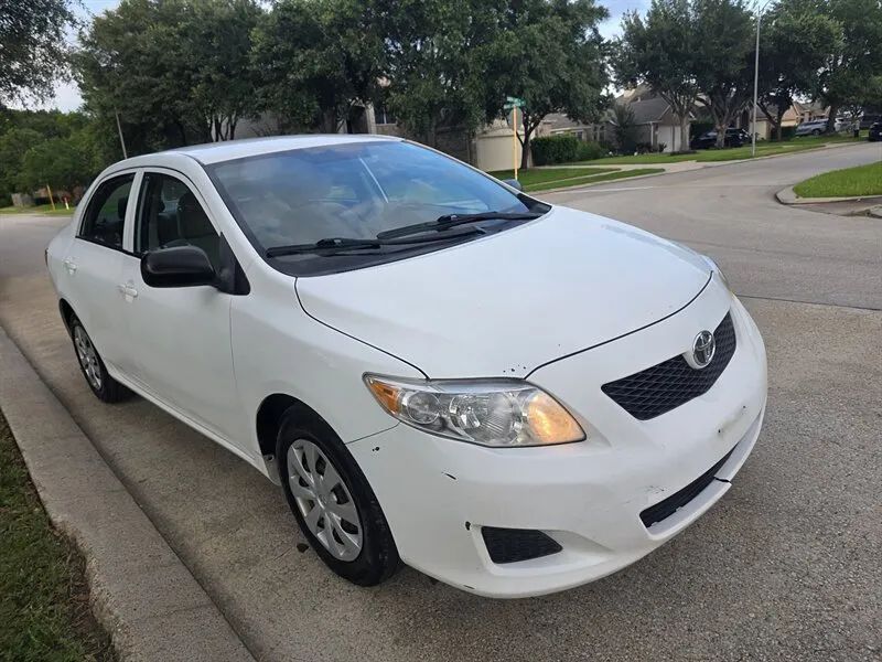 2010 Toyota Corolla Sedan 4D used vehicle photo 1 near Houston TX