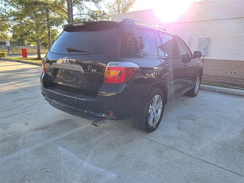 Black 2008 Toyota Highlander Sport rear exterior near Houston TX