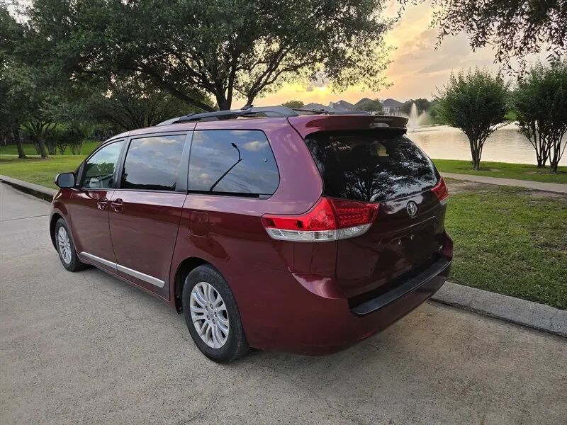 Red 2013 Toyota Sienna rear liftgate and cargo access near Houston TX